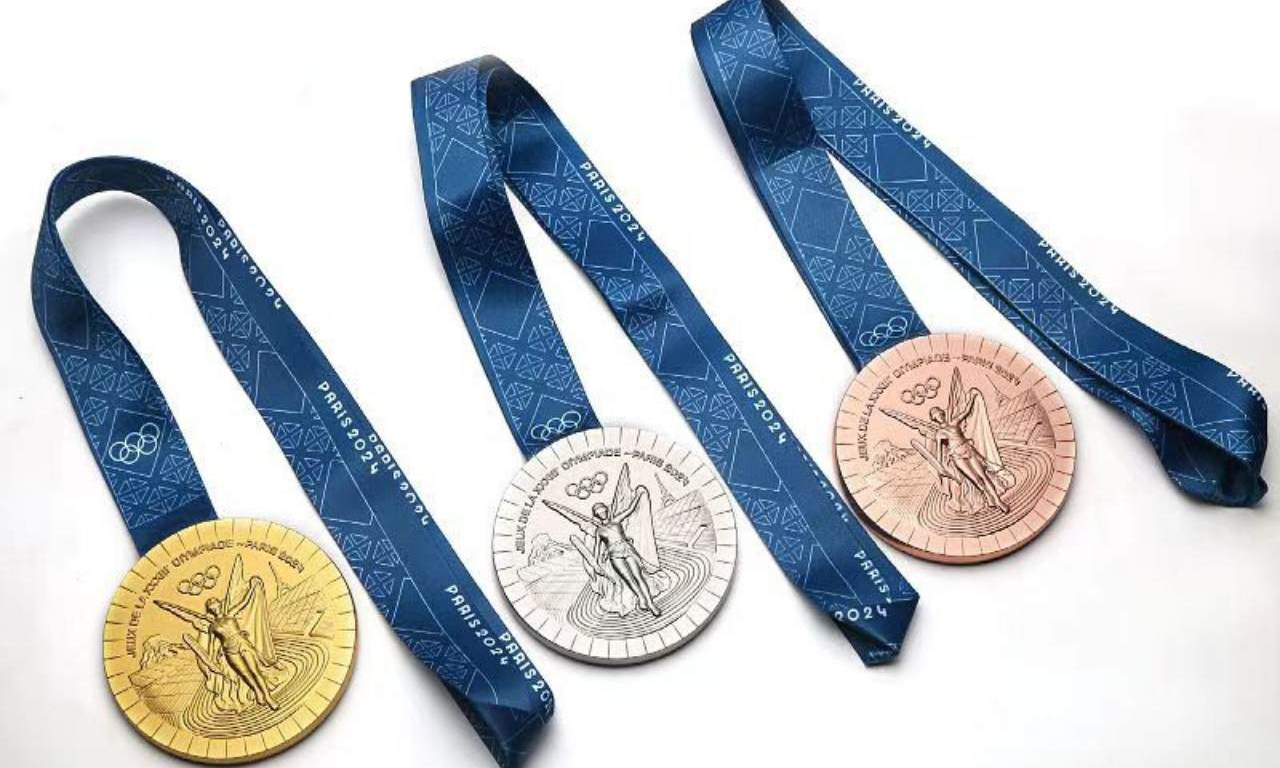 นักกีฬาโอลิมปิก กัดเหรียญทำไม? เพราะอยากรู้ว่าเป็นเหรียญทองจริงหรือเปล่า